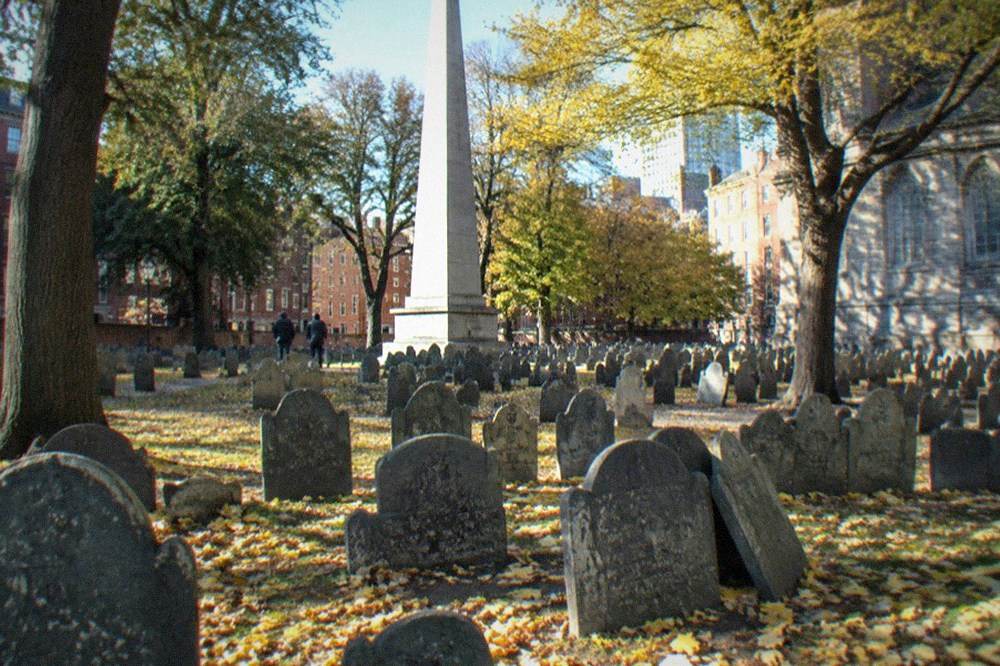 Granary Burying Ground with the obelisk marking Benjamin Franklin's parents' grave and rows of slate headstones