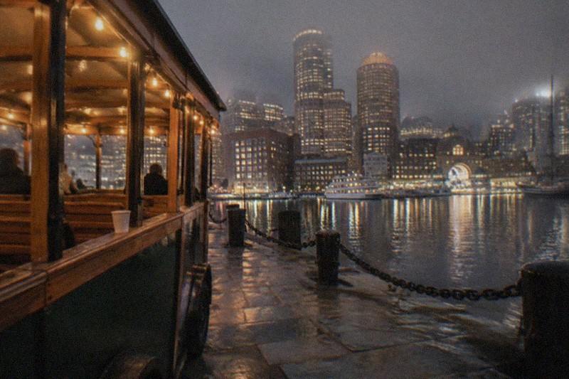 A haunted ghost trolley riding through nighttime Boston